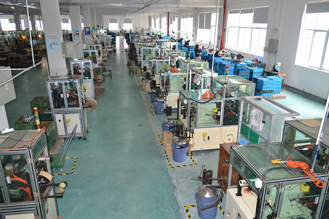 Rows of motor-production equipment and workstations