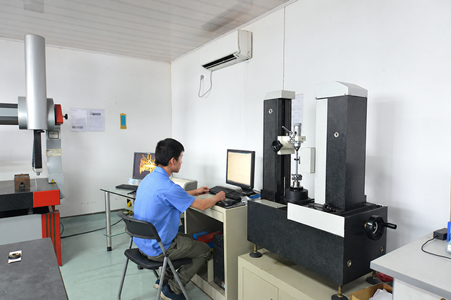 An inspection operator working with measurement equipment