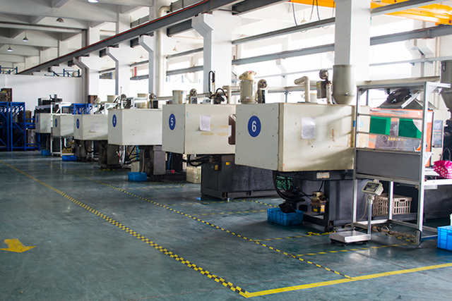 A row of numbered moulding machines