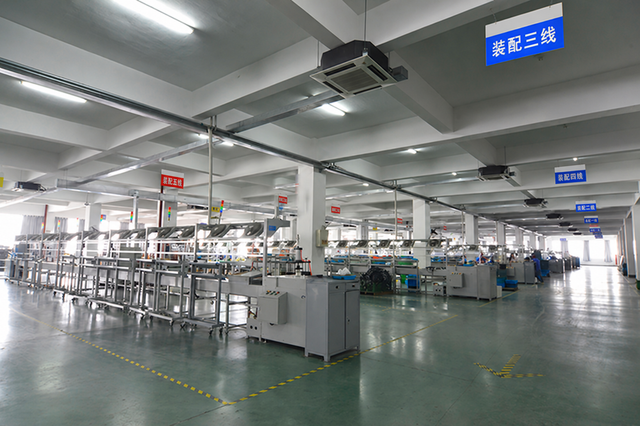 An assembly hall with marked production lines and workstations